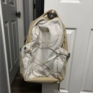 The North Face White and Tan Backpack